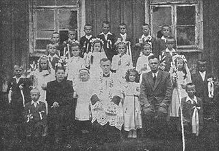 Karol como sacerdote en la imagen de la primera comunión
