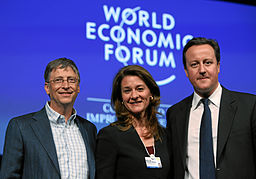 Bill y Melinda Gates con el primer ministro británico David Cameron