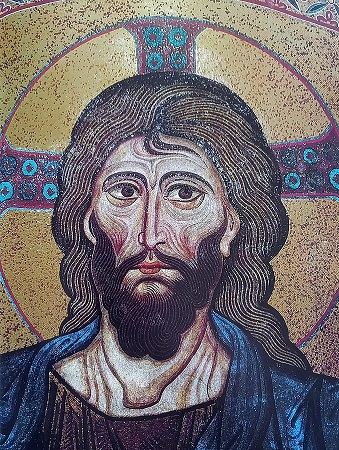 Una imagen de una obra de arte en mosaico de Cristo, que se representa con un halo