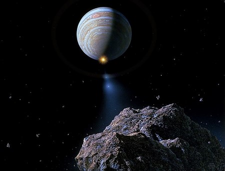 Una impresión artística del cometa Shoemaker Levy acercándose a Júpiter desde la perspectiva del cometa.