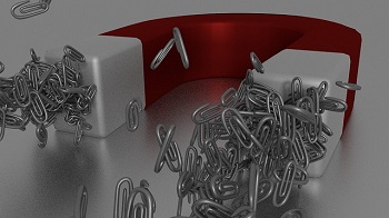 imagen de imán atrayendo clips de papel