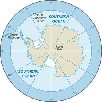 Un mapa redondo muestra el continente de la Antártida en color beige y blanco, rodeado por el Océano Austral en tonos de azul.