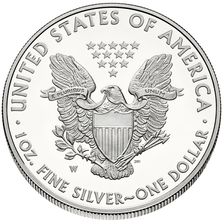 Imagen de una moneda de plata con un águila detrás de un escudo.