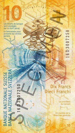 Imagen de un billete amarillo de 10 francos con vías de ferrocarril y piezas de reloj.