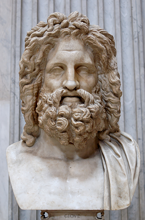 Imagen de una estatua de la cabeza de Zeus con cabello largo y barba.